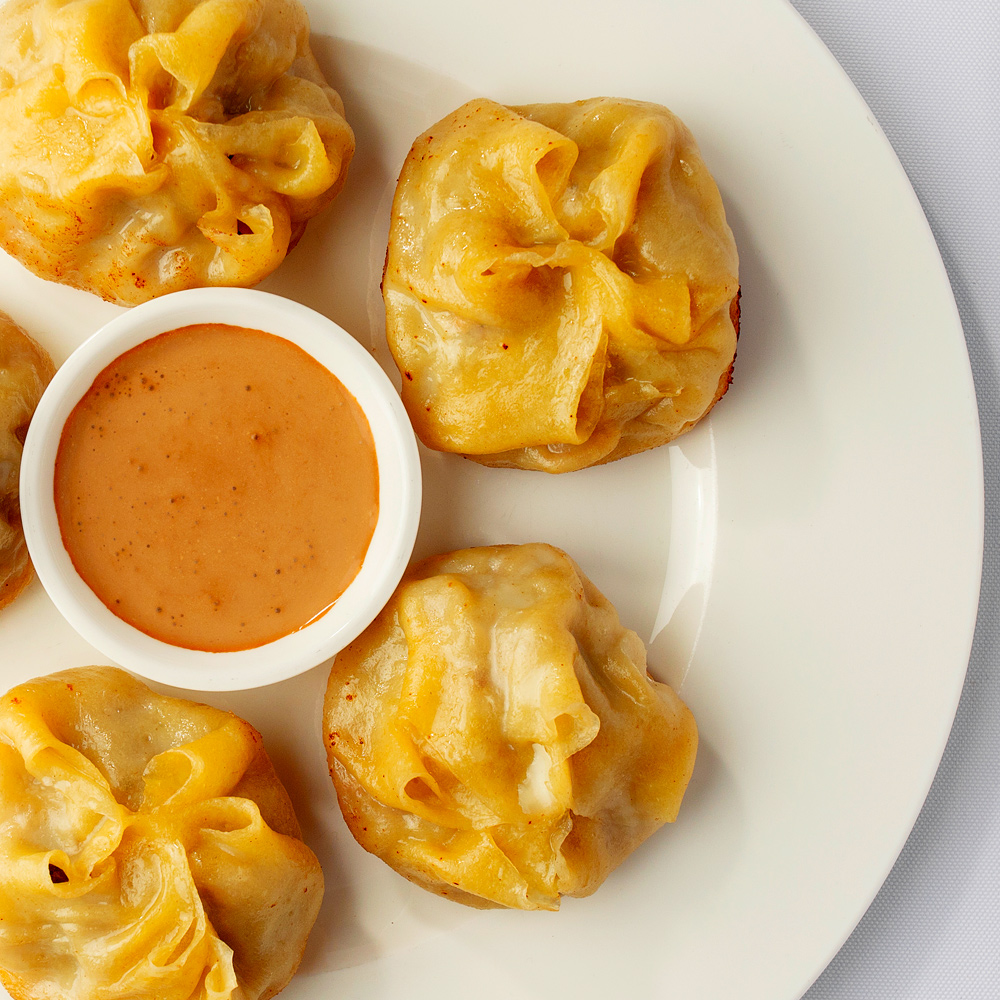 Buuz – Steamed dumplings filled with minced mutton or beef, cooked so the meat simmers in its own savory juices.