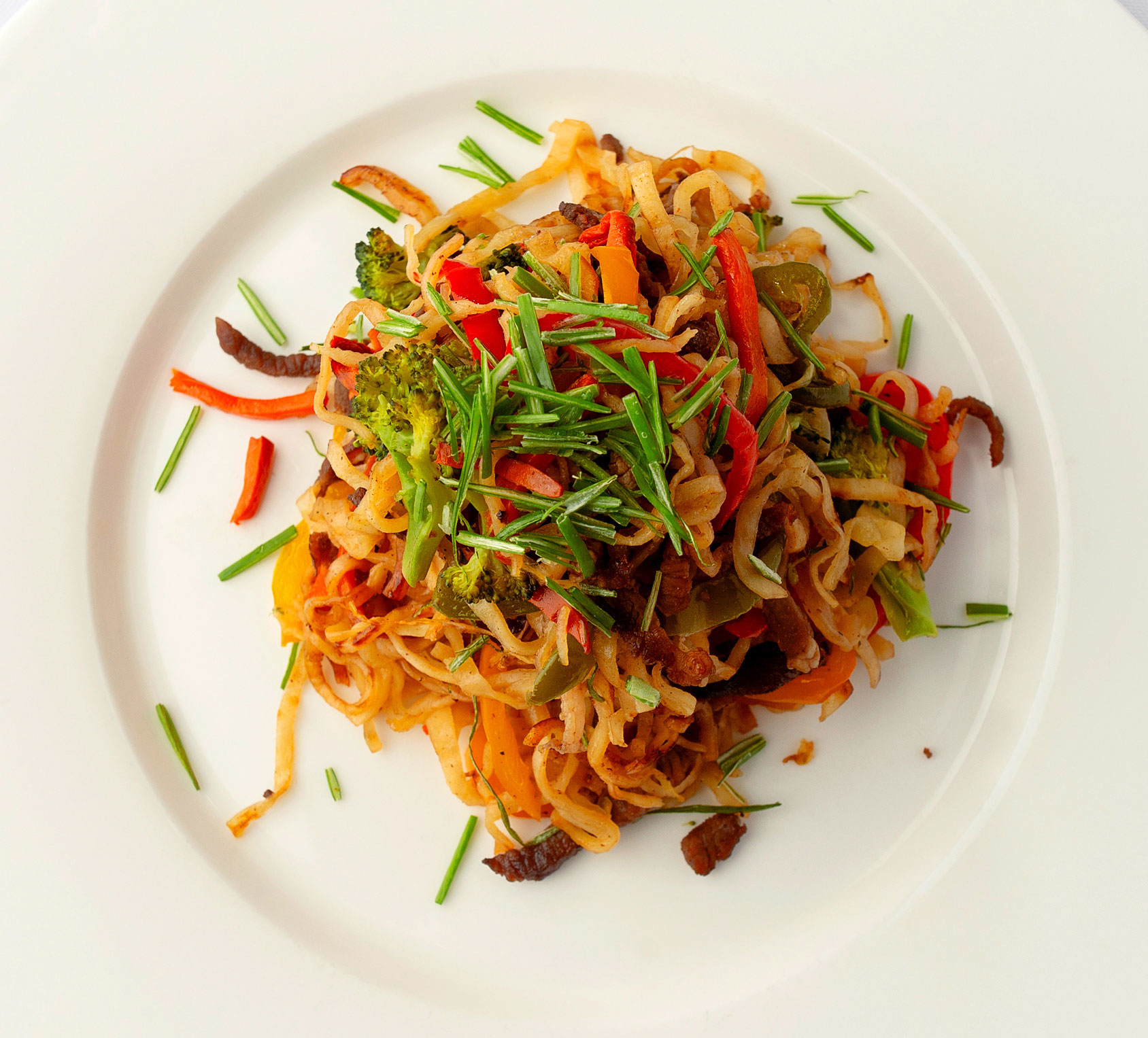 Tsuivan – A hearty noodle dish stir-fried with meat and vegetables, then steamed to lock in flavor. It’s Mongolian comfort food at its best.